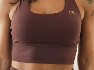 alt="brassière Glow Club burgundy edition activewear ambrée"
